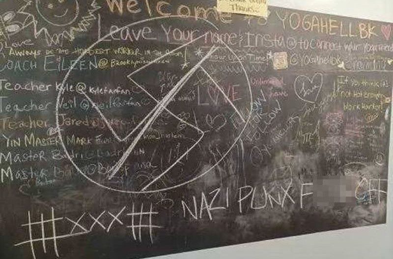 A large swastika was drawn on the Yoga Hell blackboard. (Courtesy of Katia Riva/Yoga Hell)