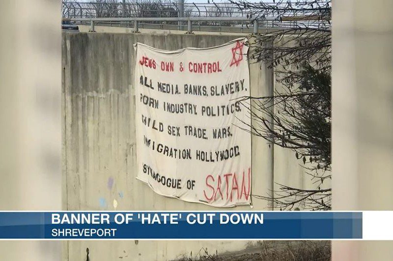 An antisemitic banner on the I-20 overpass